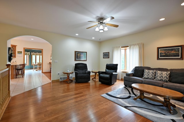 N5020 Red Pine Trl, Evergreen Twp, WI 54801 - living room featuring arched walkways, ceiling fan, healthy amount of natural light, light wood finished floors, and recessed lighting