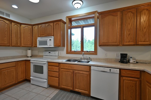 N5020 Red Pine Trl, Evergreen Twp, WI 54801 - kitchen featuring white appliances, brown cabinetry, and recessed lighting