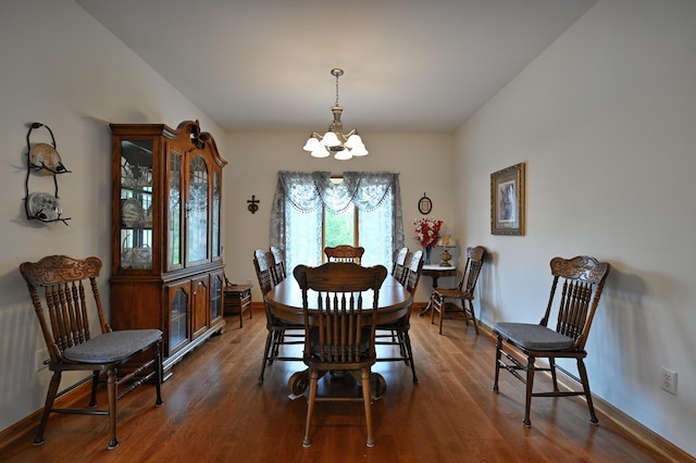 N5020 Red Pine Trl, Evergreen Twp, WI 54801 - dining area with a chandelier and dark wood-style floors