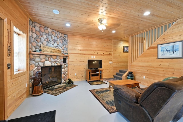 N5020 Red Pine Trl, Evergreen Twp, WI 54801 - living area with wooden ceiling, finished concrete floors, stairway, recessed lighting, and wood walls