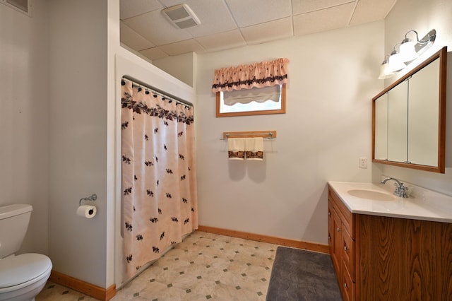 N5020 Red Pine Trl, Evergreen Twp, WI 54801 - full bathroom with a paneled ceiling, vanity, tile patterned floors, and a shower with curtain