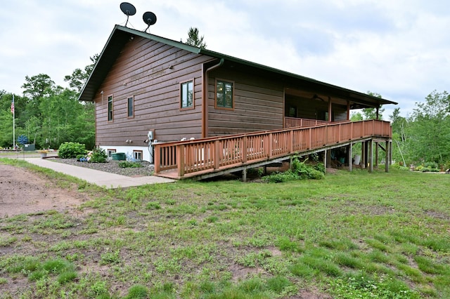 N5020 Red Pine Trl, Evergreen Twp, WI 54801 - view of property exterior with a wooden deck and a yard