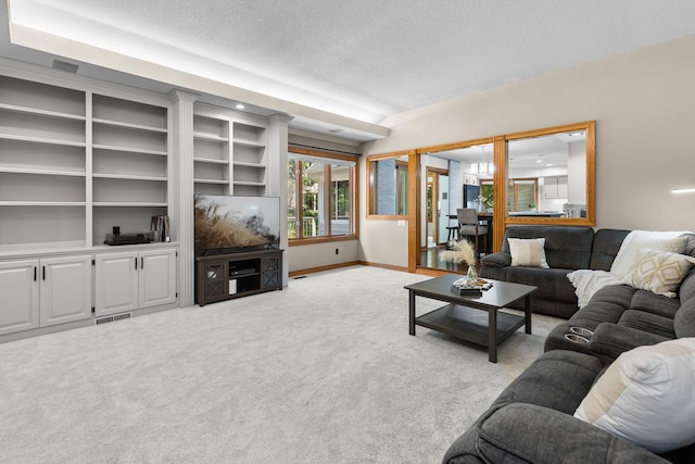 11280 Bluestem Ln, Eden Prairie, MN 55347 - living room with carpet, a textured ceiling, and built in features