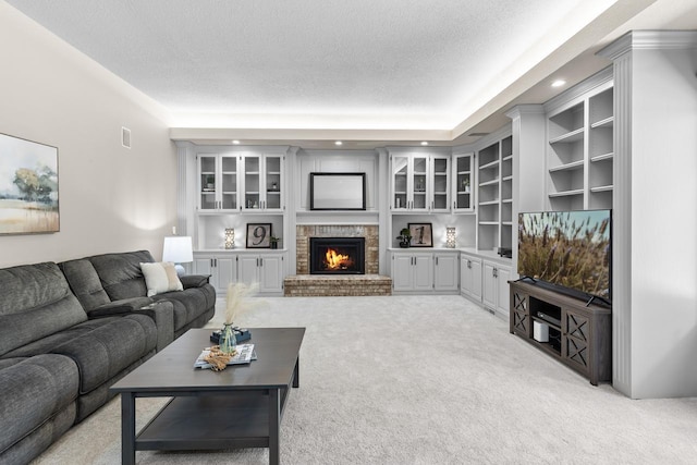 11280 Bluestem Ln, Eden Prairie, MN 55347 - living area featuring light carpet, a textured ceiling, a brick fireplace, and recessed lighting