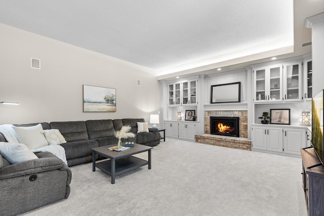 11280 Bluestem Ln, Eden Prairie, MN 55347 - living room featuring light colored carpet, a brick fireplace, and recessed lighting