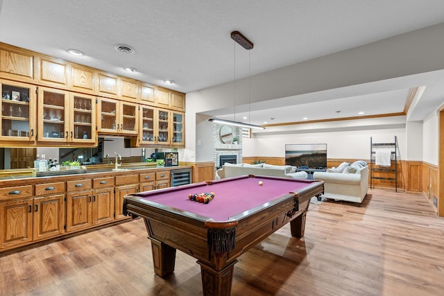 11280 Bluestem Ln, Eden Prairie, MN 55347 - game room featuring wainscoting, light wood-type flooring, beverage cooler, billiards, and recessed lighting