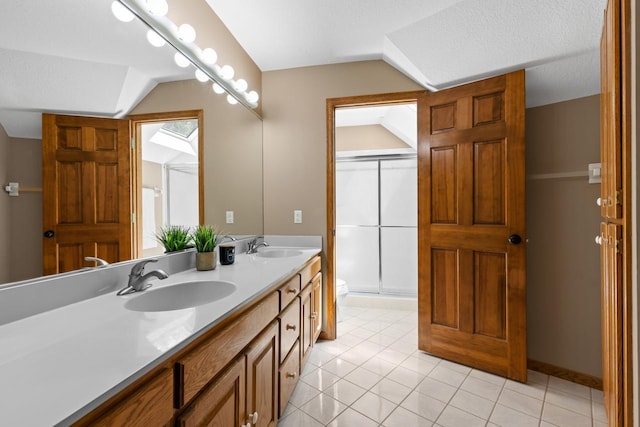 11280 Bluestem Ln, Eden Prairie, MN 55347 - full bath featuring double vanity, a shower stall, lofted ceiling, and tile patterned floors