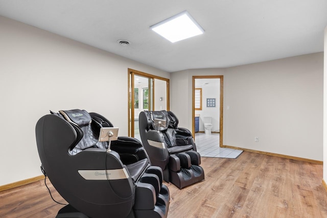 11280 Bluestem Ln, Eden Prairie, MN 55347 - living area with light wood finished floors and baseboards