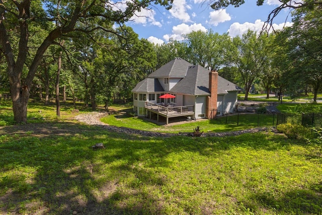 11280 Bluestem Ln, Eden Prairie, MN 55347 - back of house featuring a deck and a chimney