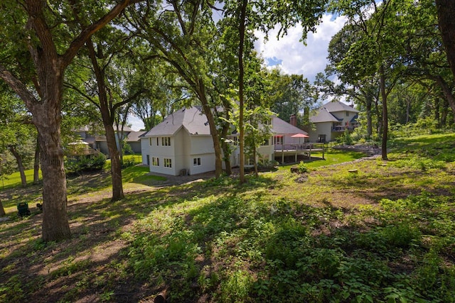 11280 Bluestem Ln, Eden Prairie, MN 55347 - view of grassy yard featuring a wooden deck