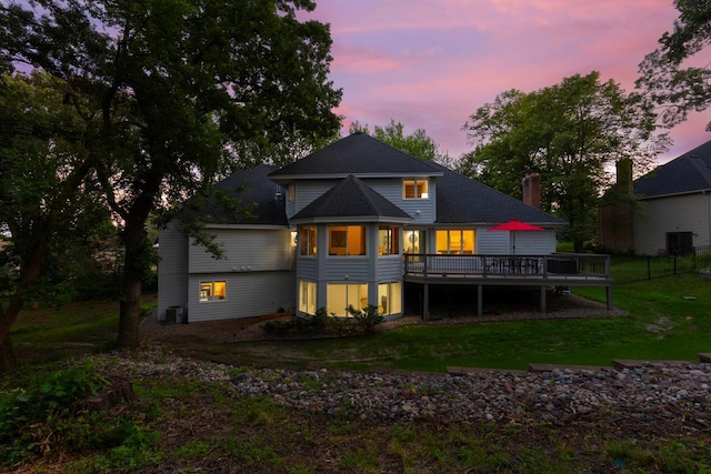 11280 Bluestem Ln, Eden Prairie, MN 55347 - back of property with a deck and a chimney
