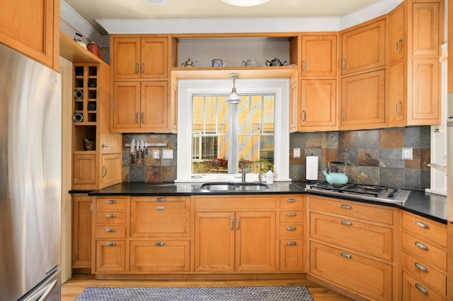 901 42nd St, Minneapolis, MN 55409 - kitchen with stainless steel appliances, tasteful backsplash, brown cabinetry, dark countertops, and open shelves