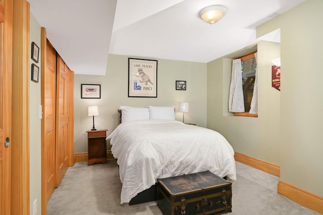 901 42nd St, Minneapolis, MN 55409 - bedroom with light colored carpet and baseboards