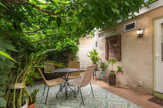 901 42nd St, Minneapolis, MN 55409 - view of patio featuring outdoor dining space