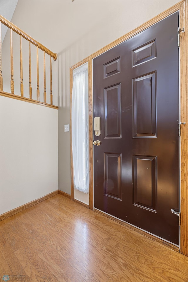 2812 Wheatland Dr S, Fargo, ND 58103 - foyer entrance with wood finished floors and baseboards