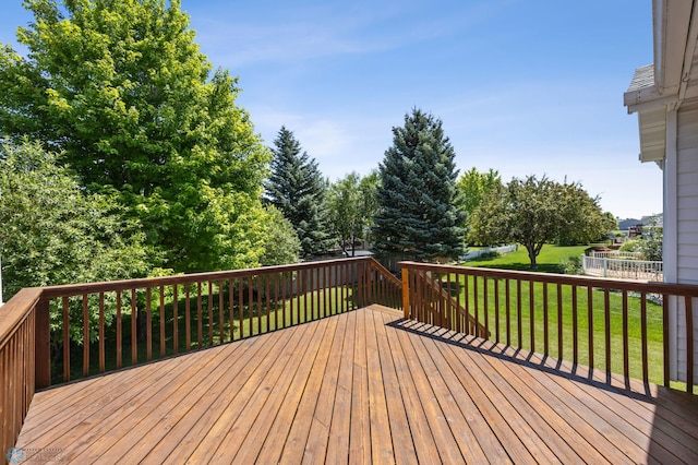 2812 Wheatland Dr S, Fargo, ND 58103 - wooden terrace with a lawn