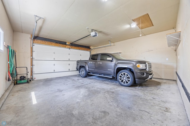 2812 Wheatland Dr S, Fargo, ND 58103 - garage featuring a garage door opener