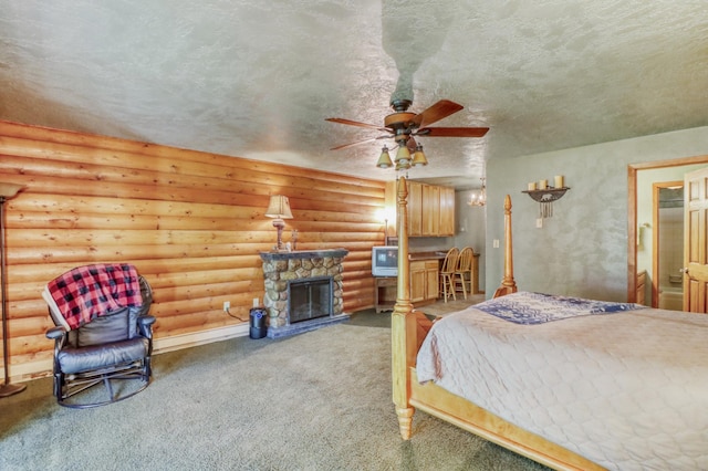 315 Park Lake Blvd Unit 104, Detroit Lakes, MN 56501 - carpeted bedroom featuring a fireplace, a textured ceiling, rustic walls, and a ceiling fan