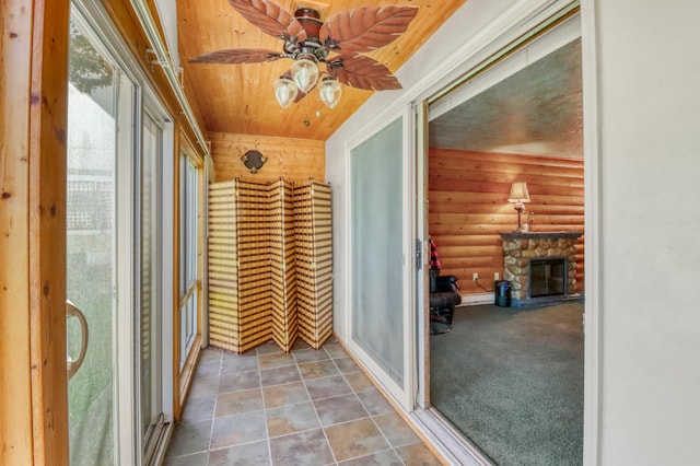 315 Park Lake Blvd Unit 104, Detroit Lakes, MN 56501 - unfurnished sunroom featuring rustic walls and wood ceiling