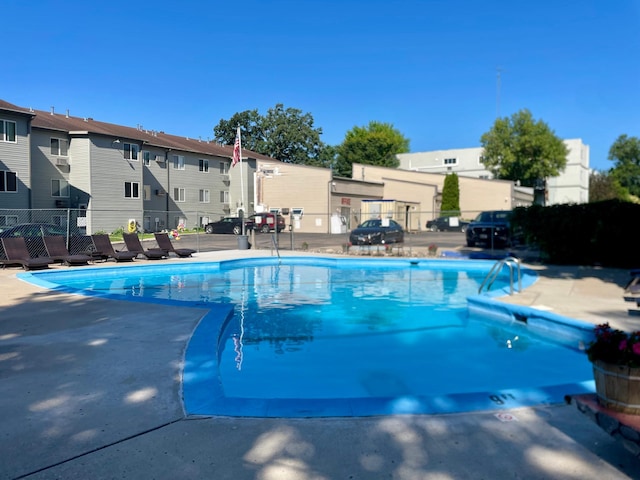 315 Park Lake Blvd Unit 104, Detroit Lakes, MN 56501 - community pool featuring a residential view