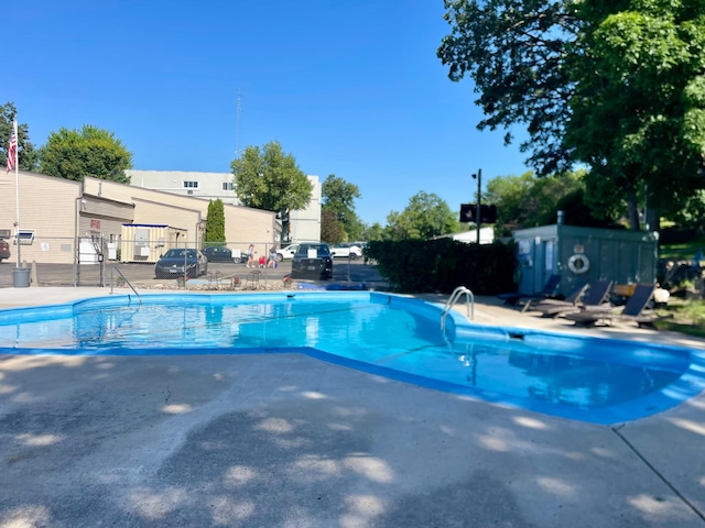 315 Park Lake Blvd Unit 104, Detroit Lakes, MN 56501 - community pool featuring a patio area