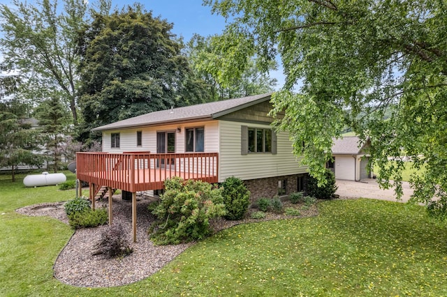 39123 Kc Dr, Homer Twp, MN 55987 - view of front of property with a front yard and a wooden deck