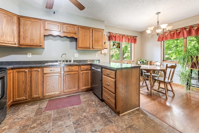 39123 Kc Dr, Homer Twp, MN 55987 - kitchen with dishwasher, a peninsula, brown cabinets, a chandelier, and a textured ceiling