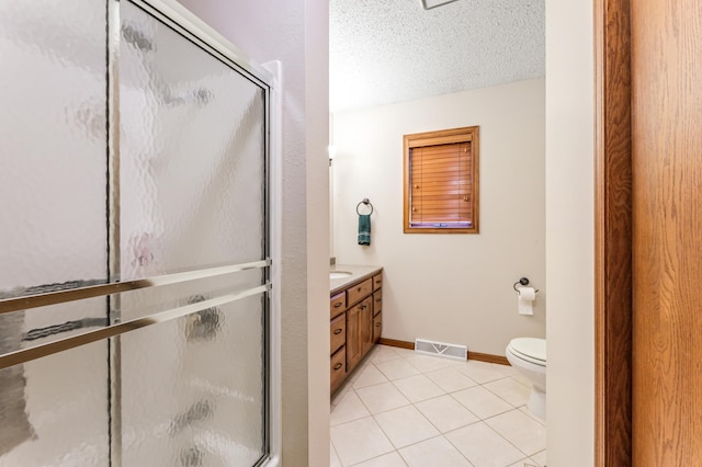39123 Kc Dr, Homer Twp, MN 55987 - full bathroom featuring an enclosed shower, vanity, tile patterned flooring, and a textured ceiling