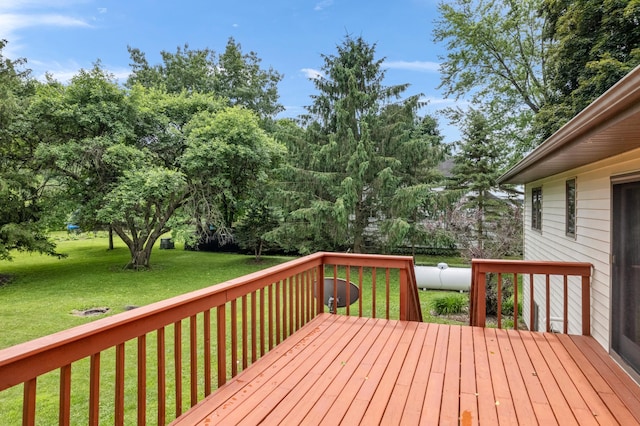 39123 Kc Dr, Homer Twp, MN 55987 - deck with a yard and view of wooded area