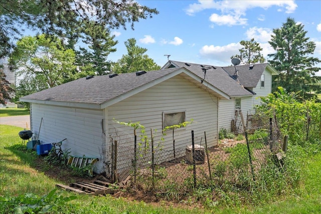 1938 190th St, Stanton Twp, WI 54017 - view of side of home with a shingled roof