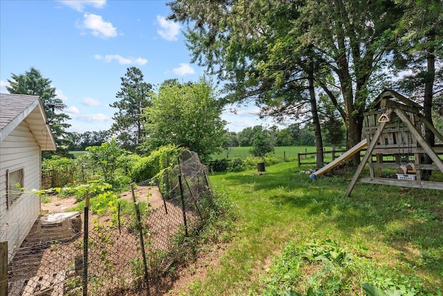 1938 190th St, Stanton Twp, WI 54017 - view of green lawn featuring a playground