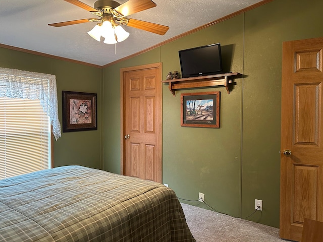 217 4th Ave SE, Pipestone, MN 56164 - carpeted bedroom featuring lofted ceiling, ornamental molding, and a ceiling fan