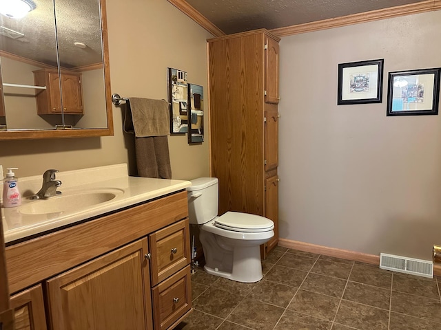 217 4th Ave SE, Pipestone, MN 56164 - bathroom with crown molding, a textured ceiling, vanity, and tile patterned flooring