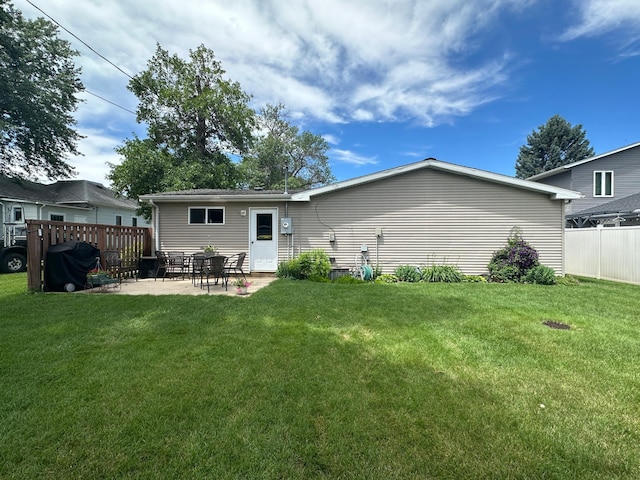 217 4th Ave SE, Pipestone, MN 56164 - back of property featuring a patio area
