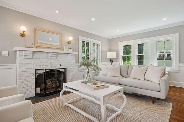 4510 Arden Ave, Edina, MN 55424 - living room featuring crown molding, wainscoting, recessed lighting, dark wood-style flooring, and a fireplace