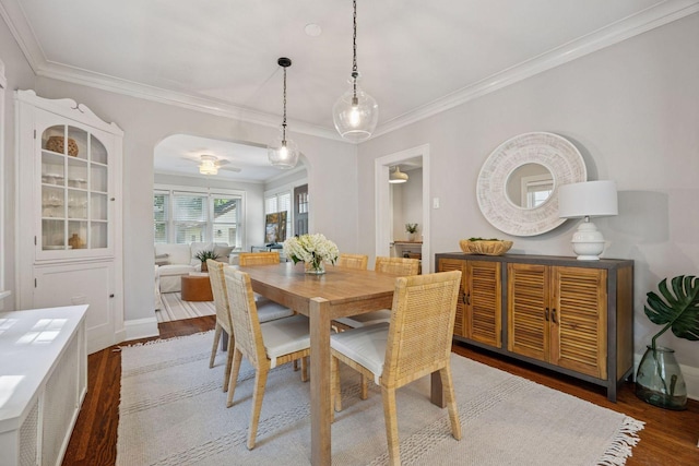 4510 Arden Ave, Edina, MN 55424 - dining area with arched walkways, ornamental molding, and wood finished floors
