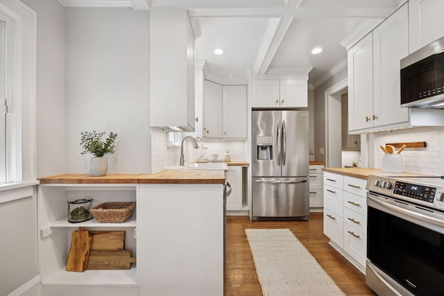 4510 Arden Ave, Edina, MN 55424 - kitchen featuring wood counters, appliances with stainless steel finishes, dark wood-style floors, crown molding, and recessed lighting