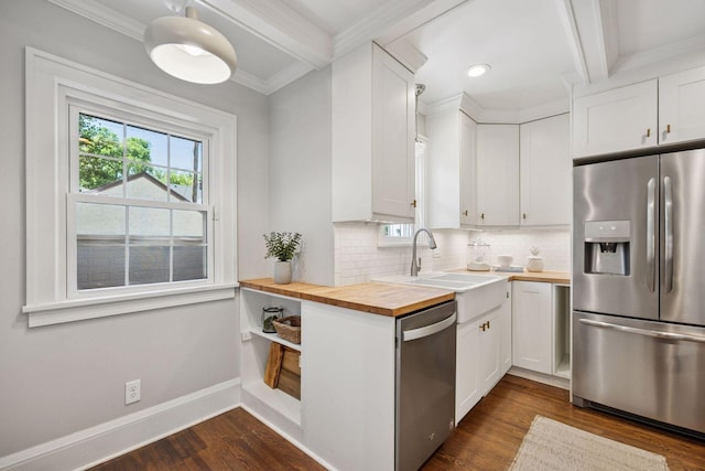 4510 Arden Ave, Edina, MN 55424 - kitchen with stainless steel appliances, wooden counters, dark wood-style floors, tasteful backsplash, and white cabinets