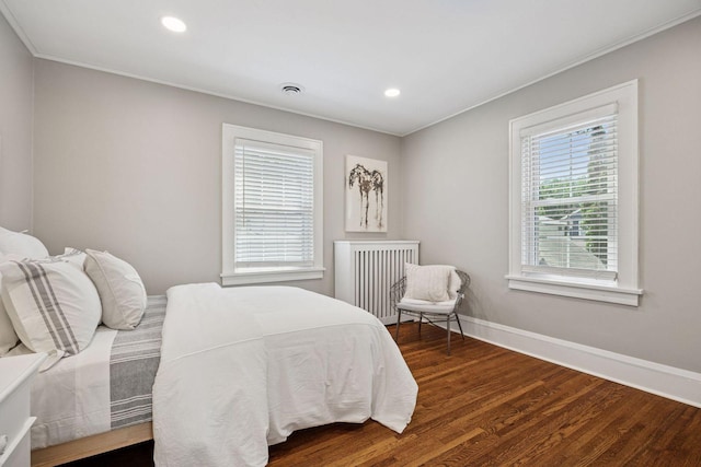 4510 Arden Ave, Edina, MN 55424 - bedroom featuring radiator heating unit, crown molding, dark wood-style flooring, and recessed lighting