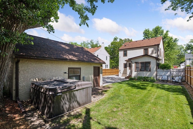 4510 Arden Ave, Edina, MN 55424 - fenced backyard with a hot tub and a patio area