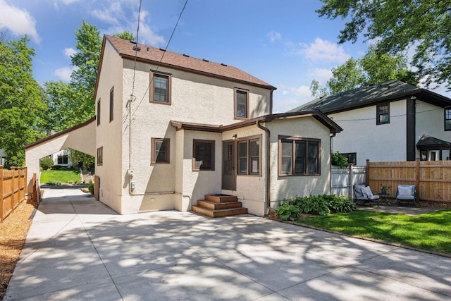 4510 Arden Ave, Edina, MN 55424 - back of property with a patio area, stucco siding, and entry steps