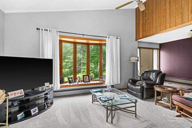 9614 Hayes Rd, Mountain Iron, MN 55768 - living room featuring carpet flooring, crown molding, baseboard heating, and a ceiling fan