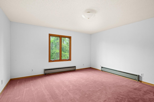 9614 Hayes Rd, Mountain Iron, MN 55768 - empty room with a baseboard radiator and carpet