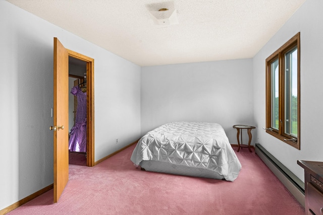9614 Hayes Rd, Mountain Iron, MN 55768 - bedroom featuring a baseboard radiator and carpet