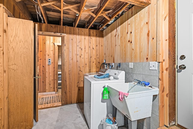 9614 Hayes Rd, Mountain Iron, MN 55768 - laundry room featuring washer / dryer and wood walls