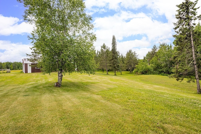 9614 Hayes Rd, Mountain Iron, MN 55768 - view of grassy yard with an outdoor structure and an outbuilding