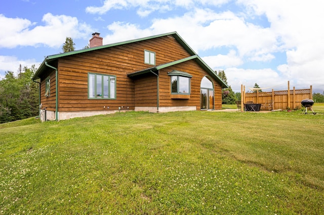 9614 Hayes Rd, Mountain Iron, MN 55768 - back of property featuring a chimney