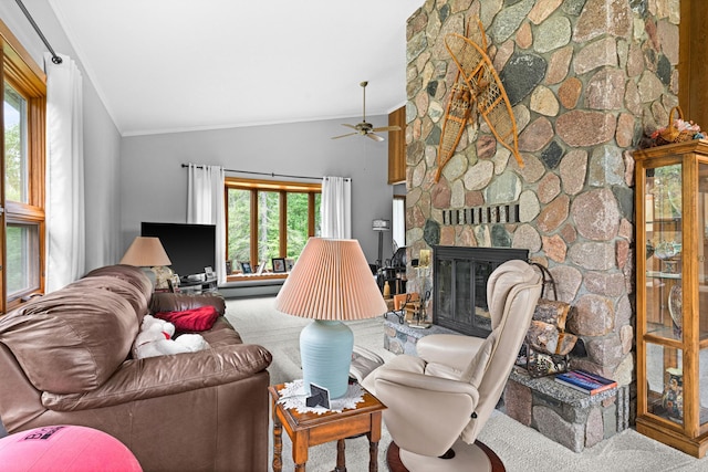 9614 Hayes Rd, Mountain Iron, MN 55768 - carpeted living area featuring ornamental molding, lofted ceiling, a fireplace, and a ceiling fan