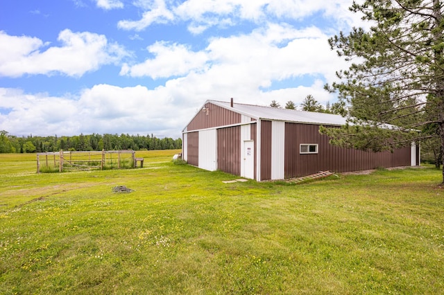 9614 Hayes Rd, Mountain Iron, MN 55768 - view of green lawn with an outbuilding and a detached garage