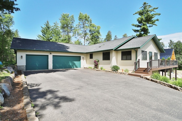 30467 Lakeview Dr, Breezy Point, MN 56472 - single story home featuring driveway, a garage, and a wooden deck